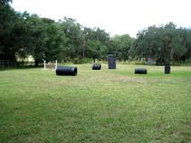 This is the secure play & training field with stadium lighting at Euro Pros K-9 Center's Sarasota headquarters location.
